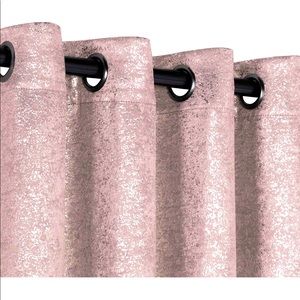 Blush curtain panels.